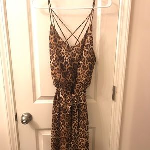 Leopard print cross backed strapped dress